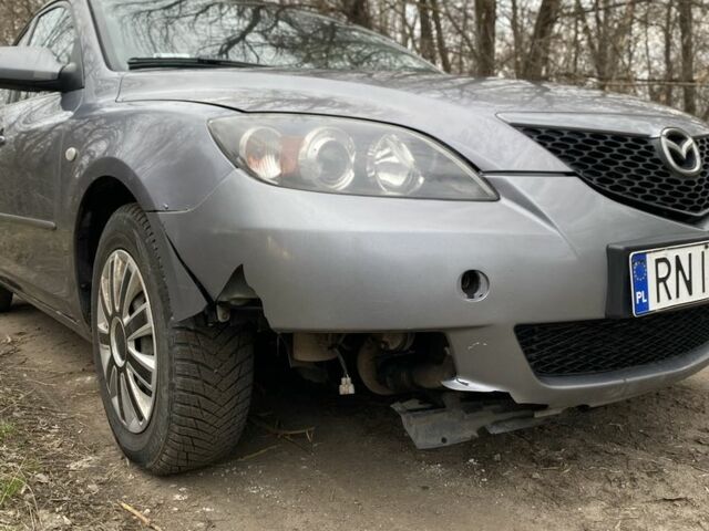 Серый Мазда 3, объемом двигателя 1.6 л и пробегом 297 тыс. км за 1986 $, фото 5 на Automoto.ua