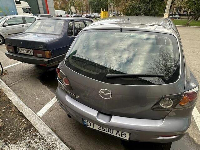 Сірий Мазда 3, об'ємом двигуна 2 л та пробігом 313 тис. км за 3300 $, фото 3 на Automoto.ua