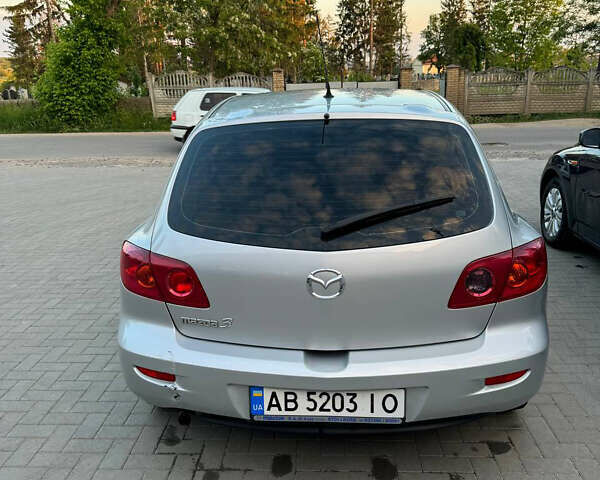 Серый Мазда 3, объемом двигателя 1.6 л и пробегом 229 тыс. км за 4000 $, фото 7 на Automoto.ua