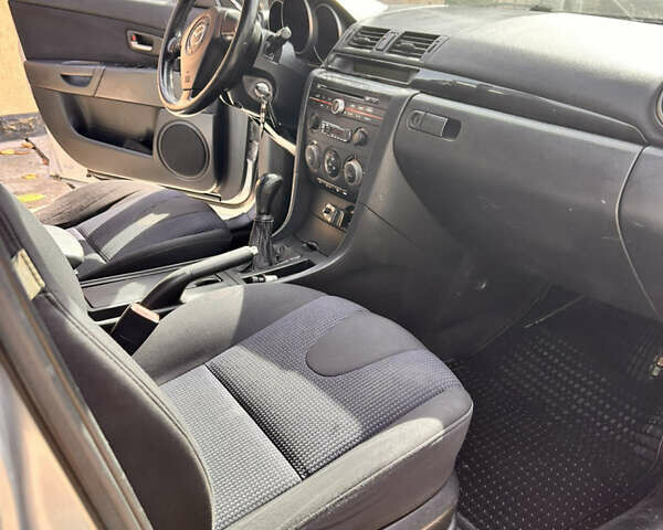 Сірий Мазда 3, об'ємом двигуна 1.56 л та пробігом 320 тис. км за 3950 $, фото 17 на Automoto.ua