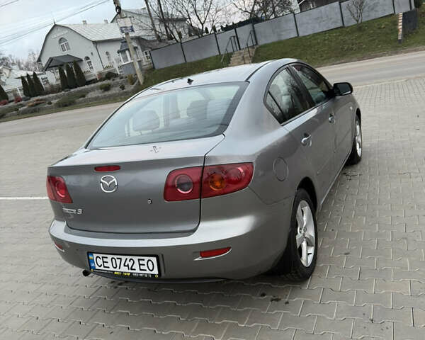 Серый Мазда 3, объемом двигателя 1.6 л и пробегом 222 тыс. км за 3599 $, фото 11 на Automoto.ua