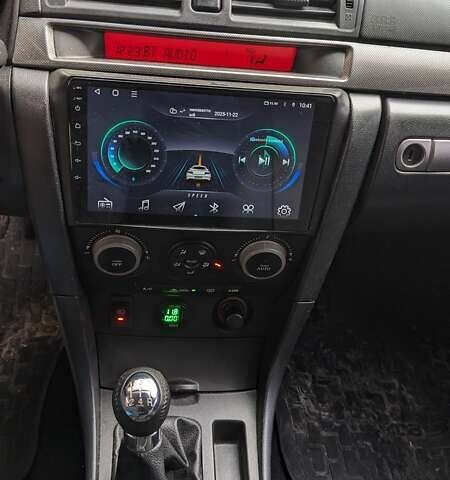 Серый Мазда 3, объемом двигателя 2 л и пробегом 145 тыс. км за 3999 $, фото 2 на Automoto.ua