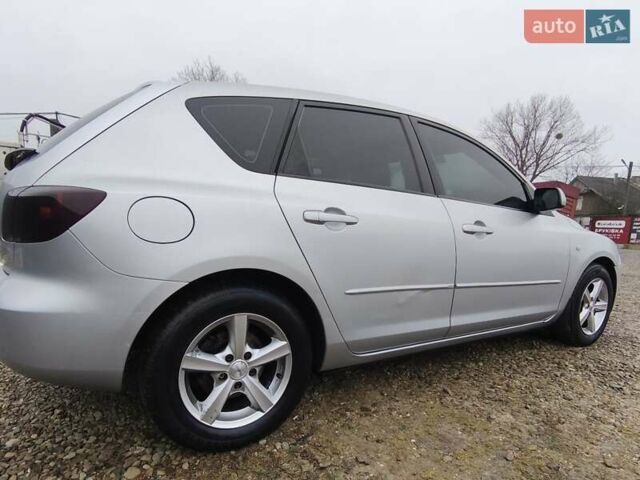 Сірий Мазда 3, об'ємом двигуна 1.6 л та пробігом 263 тис. км за 4700 $, фото 4 на Automoto.ua