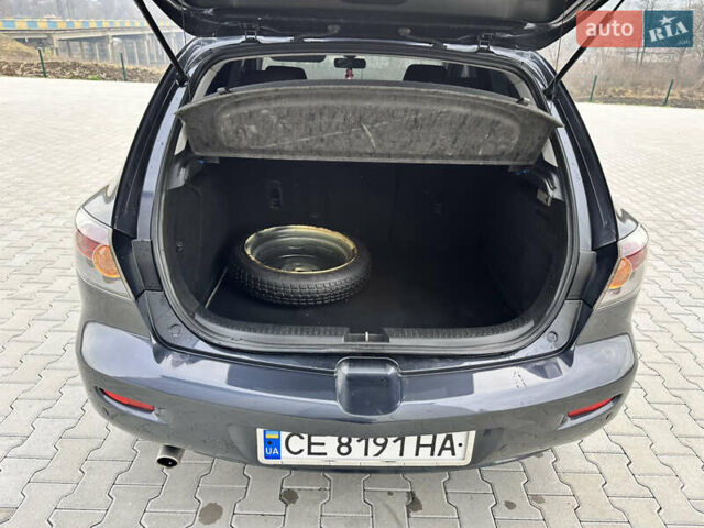 Сірий Мазда 3, об'ємом двигуна 1.6 л та пробігом 300 тис. км за 4500 $, фото 28 на Automoto.ua