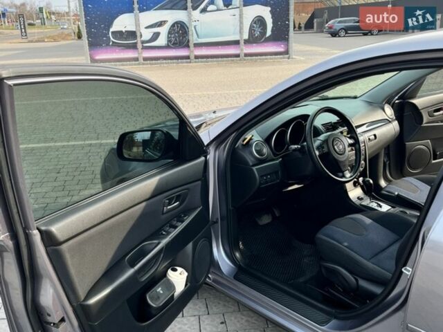 Серый Мазда 3, объемом двигателя 1.6 л и пробегом 127 тыс. км за 6300 $, фото 11 на Automoto.ua