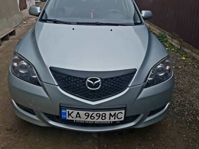 Серый Мазда 3, объемом двигателя 1.6 л и пробегом 206 тыс. км за 3950 $, фото 1 на Automoto.ua