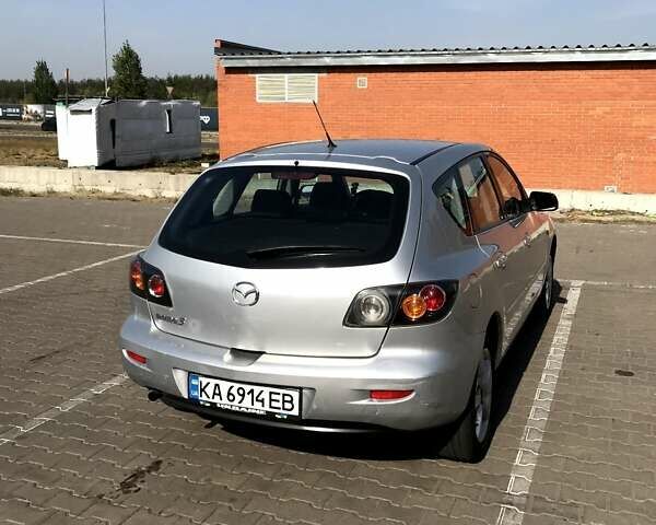 Серый Мазда 3, объемом двигателя 1.3 л и пробегом 235 тыс. км за 3400 $, фото 4 на Automoto.ua