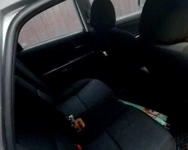 Серый Мазда 3, объемом двигателя 1.6 л и пробегом 206 тыс. км за 3950 $, фото 7 на Automoto.ua