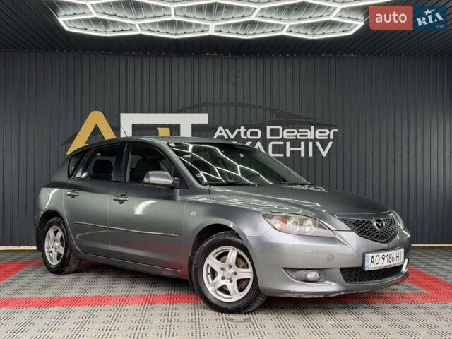 Серый Мазда 3, объемом двигателя 1.6 л и пробегом 301 тыс. км за 3400 $, фото 4 на Automoto.ua