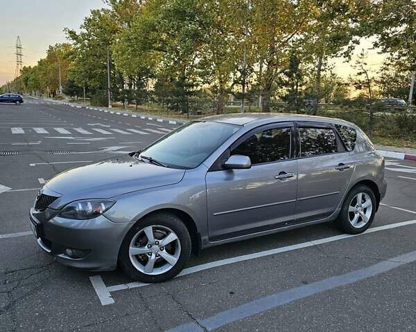 Серый Мазда 3, объемом двигателя 1.6 л и пробегом 235 тыс. км за 4999 $, фото 5 на Automoto.ua
