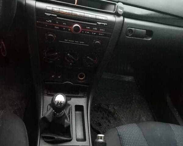 Серый Мазда 3, объемом двигателя 1.6 л и пробегом 206 тыс. км за 3950 $, фото 3 на Automoto.ua