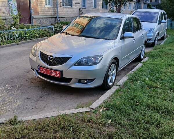 Сірий Мазда 3, об'ємом двигуна 1.6 л та пробігом 181 тис. км за 4650 $, фото 20 на Automoto.ua