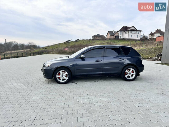 Сірий Мазда 3, об'ємом двигуна 1.6 л та пробігом 300 тис. км за 4500 $, фото 2 на Automoto.ua