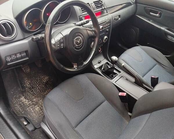 Мазда 3 2005 в Мерефа на Automoto.ua Серый Мазда 3, объемом двигателя 1.6 л и пробегом 198 тыс. км за 3900 $, фото 9 на Automoto.ua