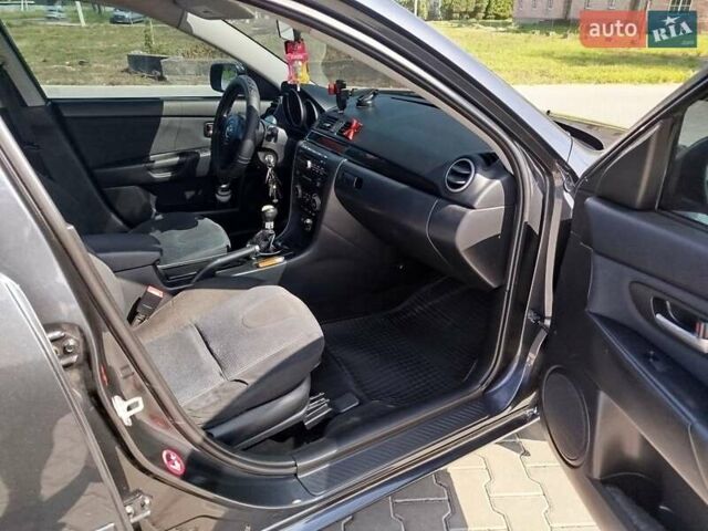Сірий Мазда 3, об'ємом двигуна 1.6 л та пробігом 297 тис. км за 5550 $, фото 13 на Automoto.ua