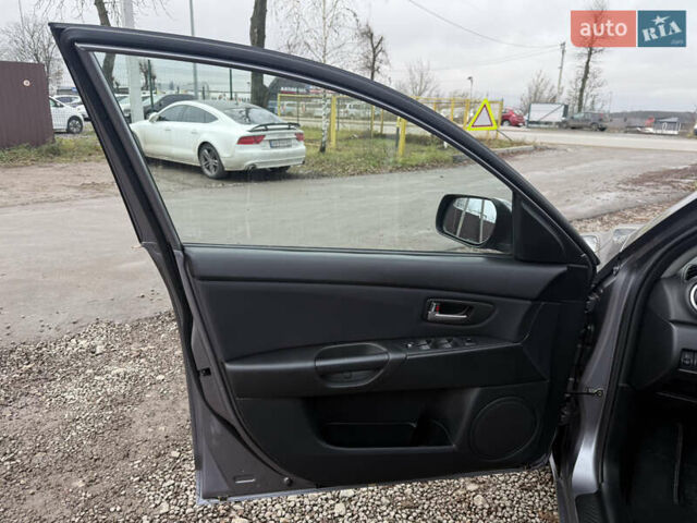 Серый Мазда 3, объемом двигателя 1.6 л и пробегом 207 тыс. км за 4600 $, фото 23 на Automoto.ua