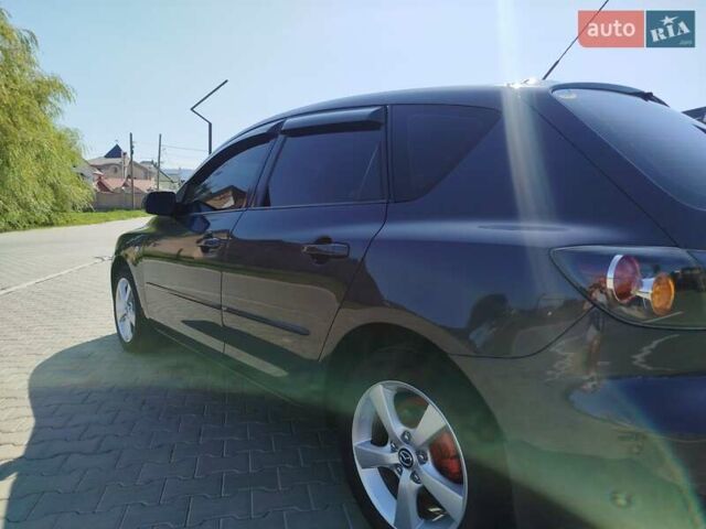 Сірий Мазда 3, об'ємом двигуна 1.6 л та пробігом 297 тис. км за 5550 $, фото 18 на Automoto.ua