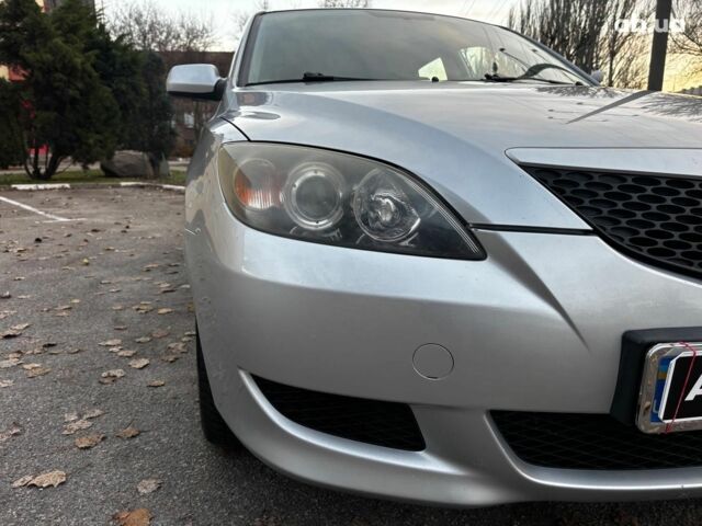 Сірий Мазда 3, об'ємом двигуна 1.4 л та пробігом 198 тис. км за 5490 $, фото 8 на Automoto.ua