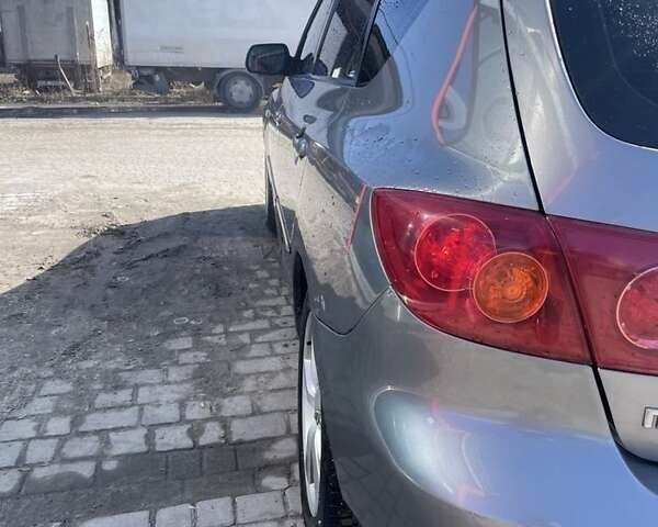 Серый Мазда 3, объемом двигателя 1.6 л и пробегом 347 тыс. км за 4200 $, фото 3 на Automoto.ua