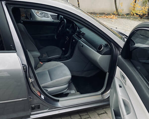 Серый Мазда 3, объемом двигателя 1.35 л и пробегом 304 тыс. км за 3500 $, фото 7 на Automoto.ua