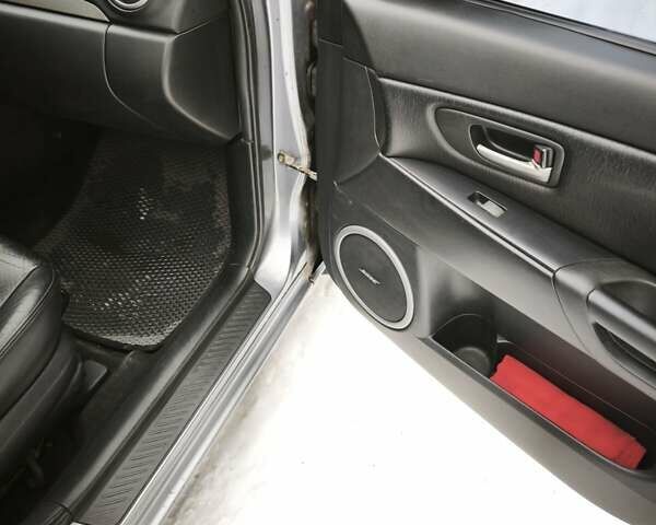 Сірий Мазда 3, об'ємом двигуна 2 л та пробігом 292 тис. км за 5700 $, фото 14 на Automoto.ua