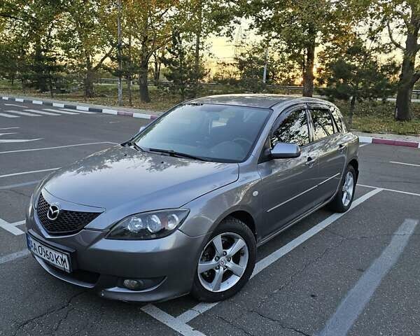 Серый Мазда 3, объемом двигателя 1.6 л и пробегом 235 тыс. км за 4999 $, фото 11 на Automoto.ua