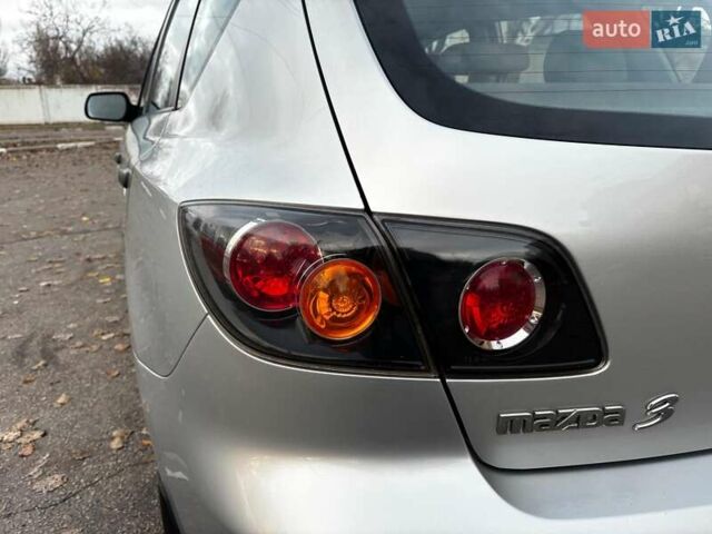 Сірий Мазда 3, об'ємом двигуна 1.4 л та пробігом 198 тис. км за 5490 $, фото 12 на Automoto.ua