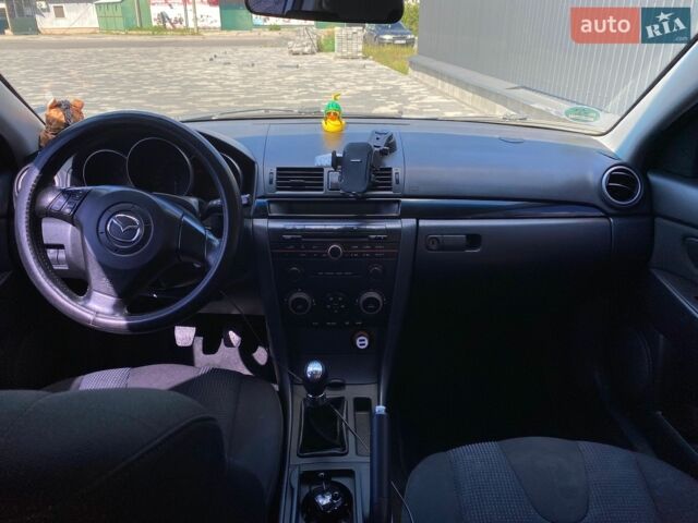 Сірий Мазда 3, об'ємом двигуна 1.6 л та пробігом 277 тис. км за 3650 $, фото 13 на Automoto.ua