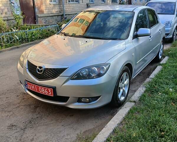 Сірий Мазда 3, об'ємом двигуна 1.6 л та пробігом 181 тис. км за 4650 $, фото 14 на Automoto.ua