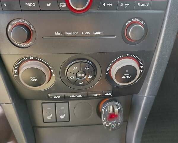 Сірий Мазда 3, об'ємом двигуна 1.6 л та пробігом 297 тис. км за 5550 $, фото 10 на Automoto.ua