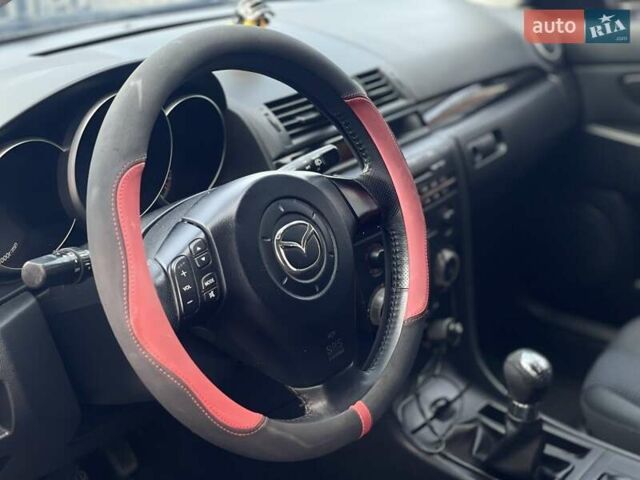 Сірий Мазда 3, об'ємом двигуна 1.6 л та пробігом 258 тис. км за 4600 $, фото 14 на Automoto.ua
