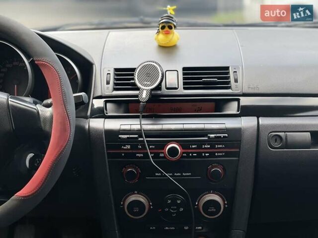 Сірий Мазда 3, об'ємом двигуна 1.6 л та пробігом 258 тис. км за 4600 $, фото 17 на Automoto.ua