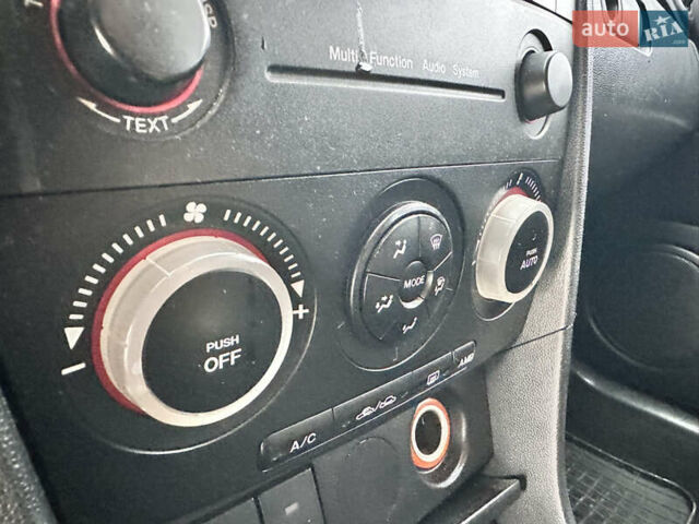 Сірий Мазда 3, об'ємом двигуна 1.6 л та пробігом 300 тис. км за 4500 $, фото 22 на Automoto.ua