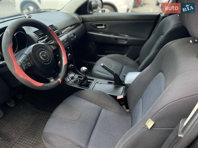 Сірий Мазда 3, об'ємом двигуна 1.6 л та пробігом 258 тис. км за 4600 $, фото 11 на Automoto.ua