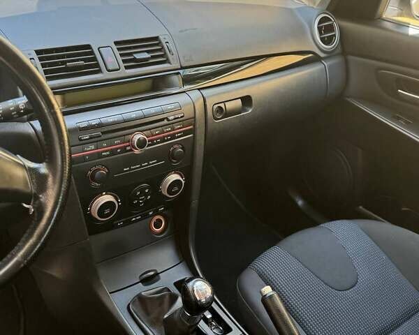 Сірий Мазда 3, об'ємом двигуна 1.6 л та пробігом 181 тис. км за 4650 $, фото 19 на Automoto.ua