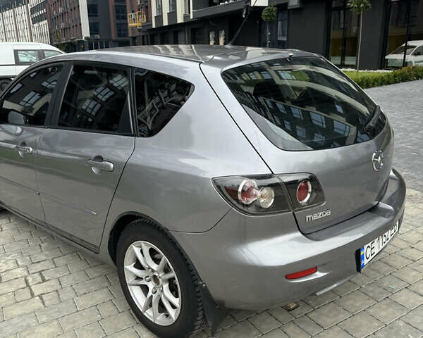 Сірий Мазда 3, об'ємом двигуна 1.56 л та пробігом 319 тис. км за 3700 $, фото 14 на Automoto.ua