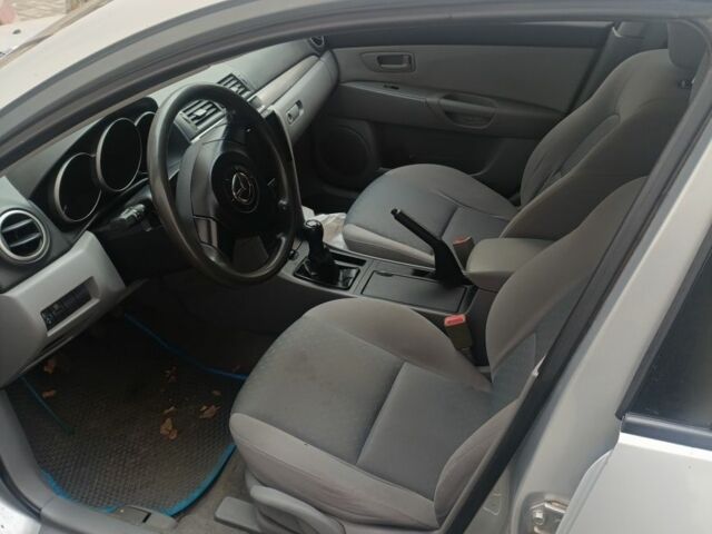 Серый Мазда 3, объемом двигателя 1.3 л и пробегом 196 тыс. км за 2700 $, фото 7 на Automoto.ua