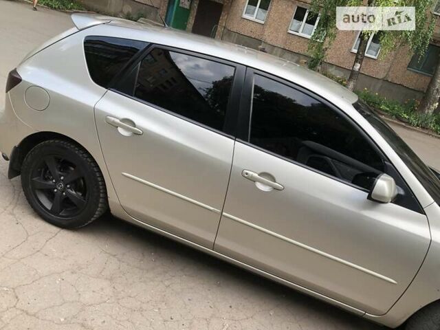 Сірий Мазда 3, об'ємом двигуна 1.6 л та пробігом 225 тис. км за 5000 $, фото 1 на Automoto.ua