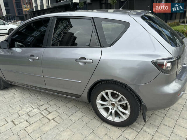 Сірий Мазда 3, об'ємом двигуна 1.56 л та пробігом 319 тис. км за 3700 $, фото 17 на Automoto.ua