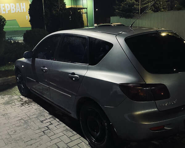 Серый Мазда 3, объемом двигателя 1.35 л и пробегом 304 тыс. км за 3500 $, фото 3 на Automoto.ua