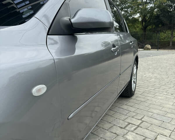 Сірий Мазда 3, об'ємом двигуна 1.56 л та пробігом 319 тис. км за 3700 $, фото 31 на Automoto.ua