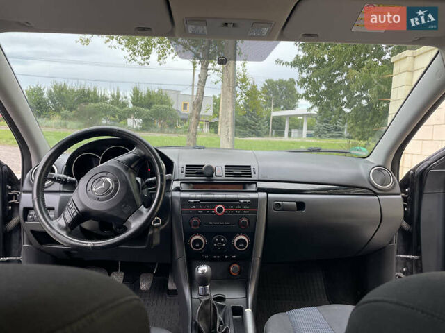 Серый Мазда 3, объемом двигателя 1.6 л и пробегом 274 тыс. км за 5200 $, фото 1 на Automoto.ua