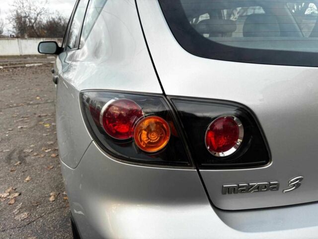 Серый Мазда 3, объемом двигателя 1.4 л и пробегом 198 тыс. км за 5490 $, фото 12 на Automoto.ua