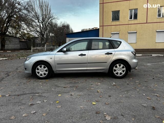 Сірий Мазда 3, об'ємом двигуна 1.4 л та пробігом 198 тис. км за 5490 $, фото 3 на Automoto.ua