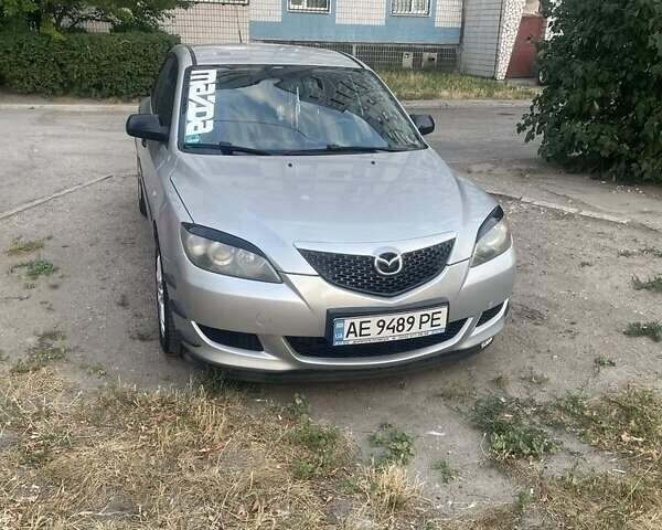 Серый Мазда 3, объемом двигателя 1.3 л и пробегом 221 тыс. км за 4999 $, фото 7 на Automoto.ua