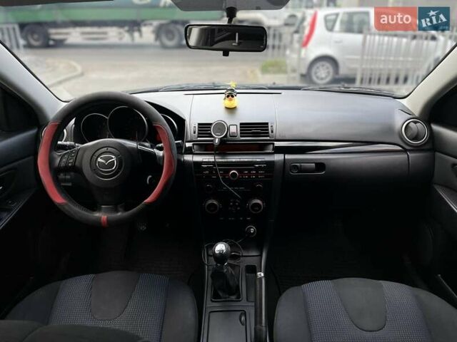 Сірий Мазда 3, об'ємом двигуна 1.6 л та пробігом 258 тис. км за 4600 $, фото 16 на Automoto.ua