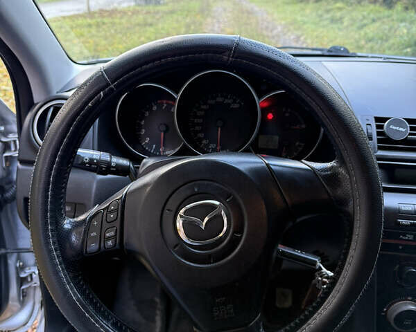 Серый Мазда 3, объемом двигателя 1.6 л и пробегом 248 тыс. км за 4800 $, фото 40 на Automoto.ua