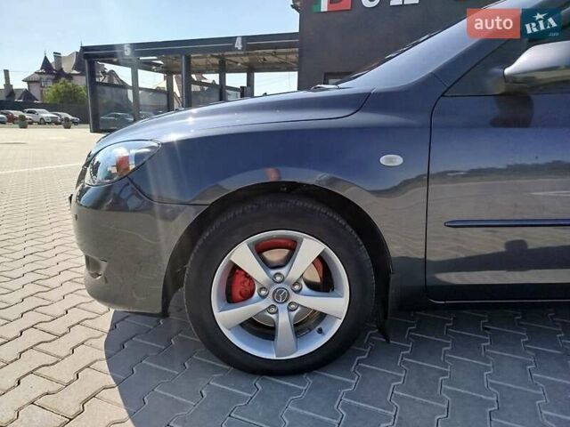Сірий Мазда 3, об'ємом двигуна 1.6 л та пробігом 297 тис. км за 5550 $, фото 22 на Automoto.ua