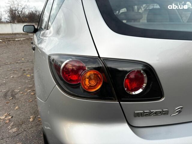 Сірий Мазда 3, об'ємом двигуна 1.4 л та пробігом 198 тис. км за 5490 $, фото 12 на Automoto.ua