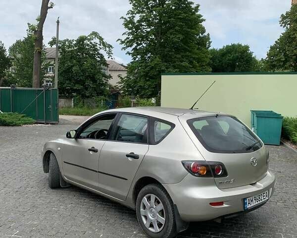Серый Мазда 3, объемом двигателя 1.3 л и пробегом 240 тыс. км за 4100 $, фото 2 на Automoto.ua